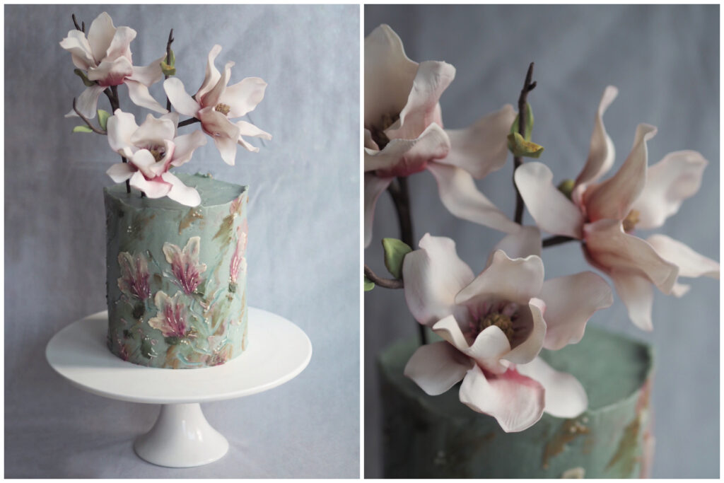 painted buttercream cake with painted impressionist magnolia and magnolia sugar flower