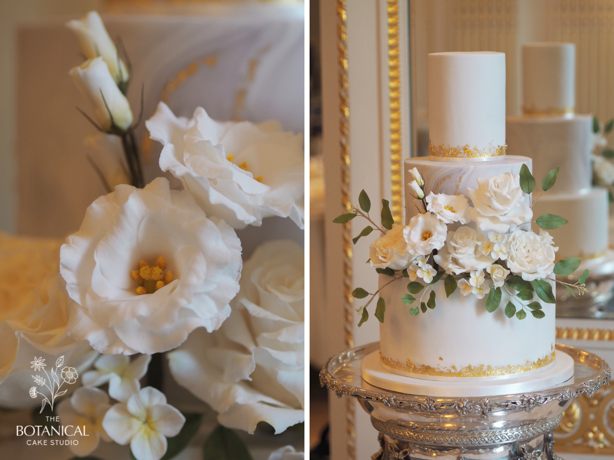 white lisianthus sugar flowers, a white marble and gold wedding cake with white sugar flowers, roses, lisianthus, hydrangea and green foliage