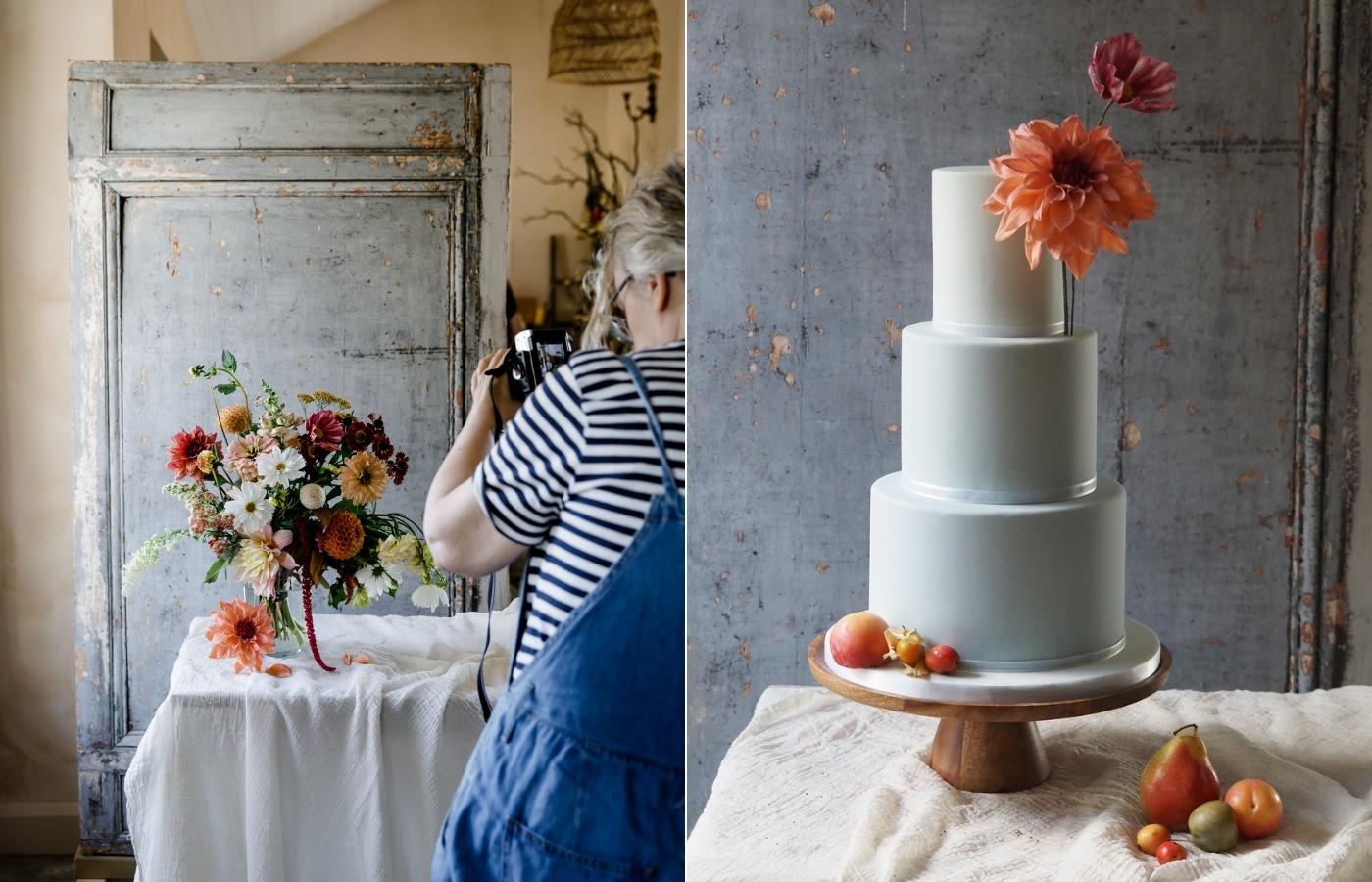 a woman taking a photo of a bouquet of flowers; an elegant 3 tier cake in wedgwood blue with statement dahlia and cosmos sugar flowers and autumnal fruits